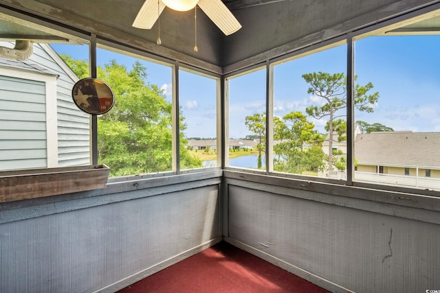 1101 Possum Trot Rd Unit A301, North Myrtle Beach, SC 29582 - unfurnished sunroom featuring a ceiling fan
