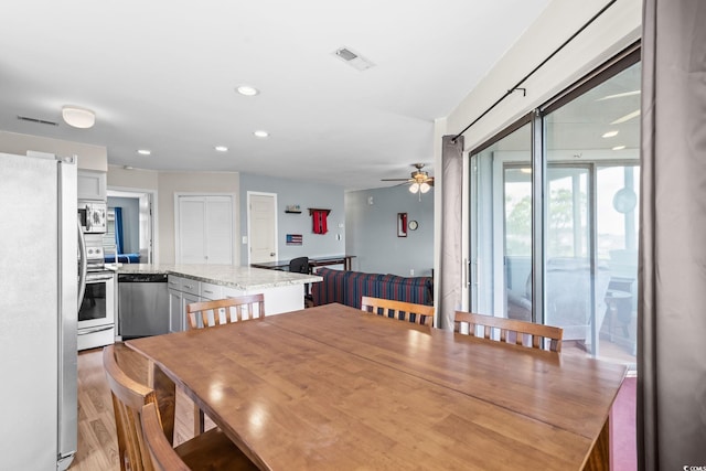 1101 Possum Trot Rd Unit A301, North Myrtle Beach, SC 29582 - dining area featuring ceiling fan, recessed lighting, and light wood finished floors