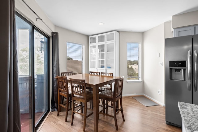 1101 Possum Trot Rd Unit A301, North Myrtle Beach, SC 29582 - dining area featuring light wood-style floors, plenty of natural light, and recessed lighting