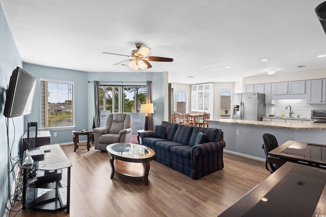 1101 Possum Trot Rd Unit A301, North Myrtle Beach, SC 29582 - living area featuring wood finished floors, ceiling fan, and recessed lighting