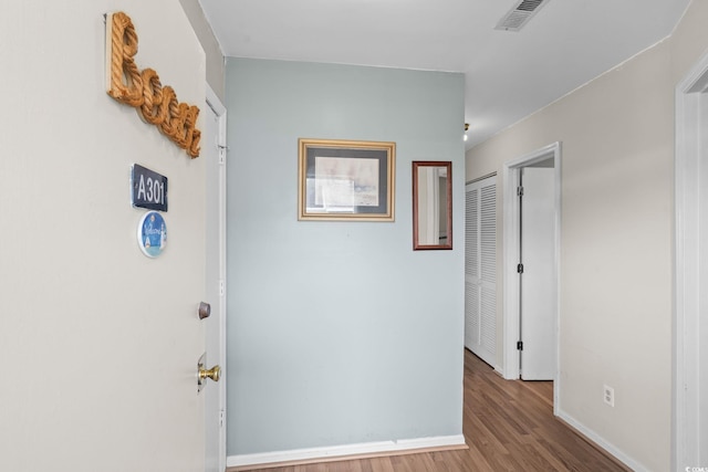 1101 Possum Trot Rd Unit A301, North Myrtle Beach, SC 29582 - hall with baseboards and wood finished floors