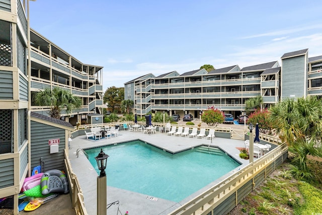 1101 Possum Trot Rd Unit A301, North Myrtle Beach, SC 29582 - community pool featuring a patio area
