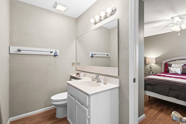 1101 Possum Trot Rd Unit A301, North Myrtle Beach, SC 29582 - bathroom with wood finished floors, vanity, ensuite bath, and ceiling fan