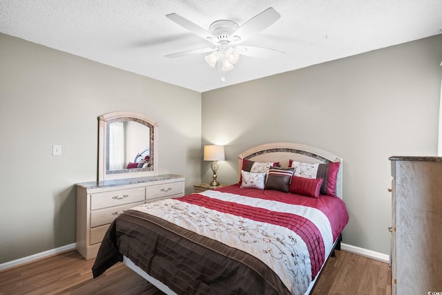 1101 Possum Trot Rd Unit A301, North Myrtle Beach, SC 29582 - bedroom featuring light wood-type flooring and ceiling fan