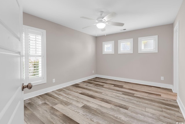 202 Clam Digger Loop, Pawleys Island, SC 29585 - empty room featuring light wood-type flooring and ceiling fan
