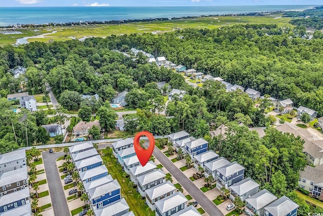 202 Clam Digger Loop, Pawleys Island, SC 29585 - aerial overview of property's location featuring a large body of water and nearby suburban area