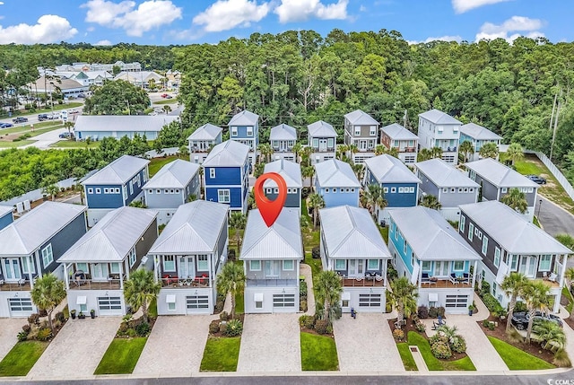 202 Clam Digger Loop, Pawleys Island, SC 29585 - aerial perspective of suburban area featuring a heavily wooded area