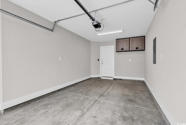 202 Clam Digger Loop, Pawleys Island, SC 29585 - garage with a garage door opener and electric panel