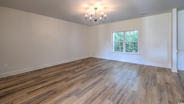 4000 Bayfield Loop, Murrells Inlet, SC 29576 - empty room featuring a chandelier and wood finished floors