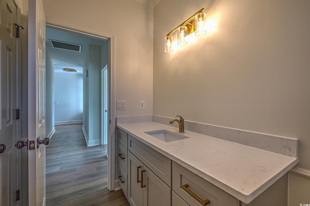 4000 Bayfield Loop, Murrells Inlet, SC 29576 - bathroom featuring wood finished floors, vanity, and ornamental molding