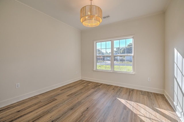 4000 Bayfield Loop, Murrells Inlet, SC 29576 - empty room featuring wood finished floors and crown molding