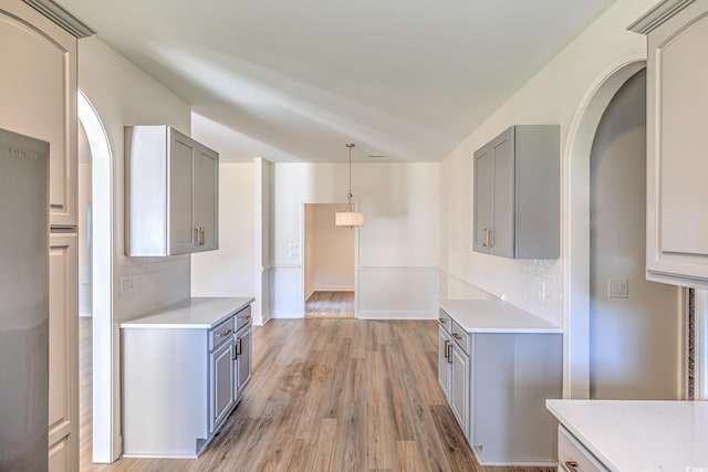 4000 Bayfield Loop, Murrells Inlet, SC 29576 - kitchen featuring gray cabinets, light countertops, and tasteful backsplash