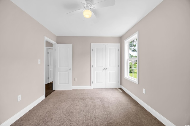 9655 Kings Grant Dr, Murrells Inlet, SC 29576 - unfurnished bedroom with carpet floors, a closet, and a ceiling fan