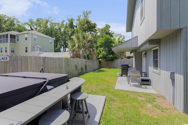 1005 28th Ave S, North Myrtle Beach, SC 29582 - fenced backyard featuring a patio area