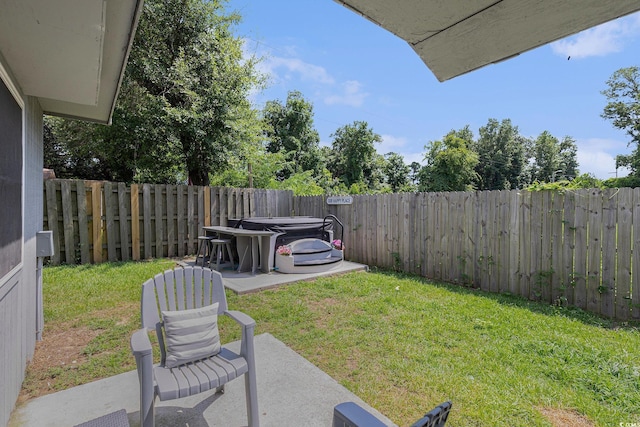 1005 28th Ave S, North Myrtle Beach, SC 29582 - fenced backyard featuring a patio area