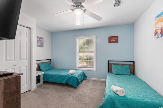 1005 28th Ave S, North Myrtle Beach, SC 29582 - bedroom featuring light colored carpet and ceiling fan