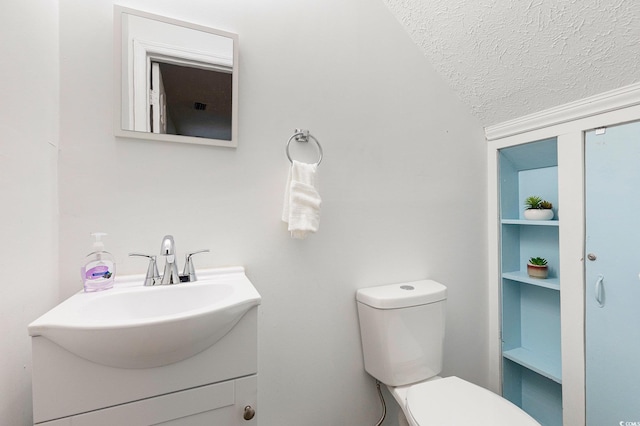 1005 28th Ave S, North Myrtle Beach, SC 29582 - half bath with vanity and a textured ceiling