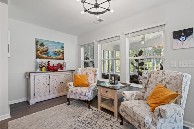 3909 On Deck Cir, Little River, SC 29566 - sitting room featuring wood finished floors and a chandelier