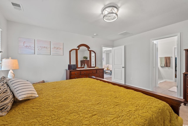 3909 On Deck Cir, Little River, SC 29566 - bedroom with ensuite bathroom and baseboards