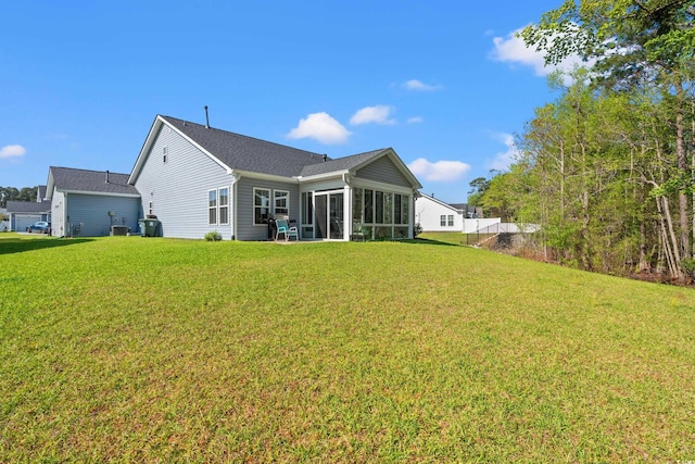 3909 On Deck Cir, Little River, SC 29566 - rear view of property with a sunroom and a lawn