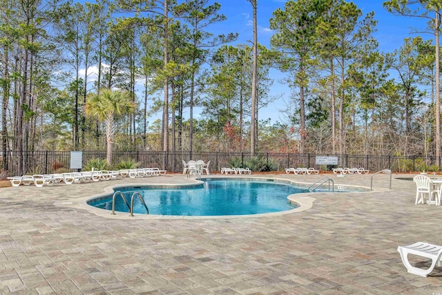 3909 On Deck Cir, Little River, SC 29566 - community pool featuring a patio area
