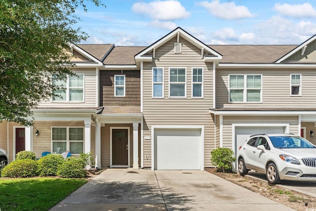 1117 Fairway Ln Unit 1117, Conway, SC 29526 - view of front facade featuring an attached garage, concrete driveway, and a shingled roof
