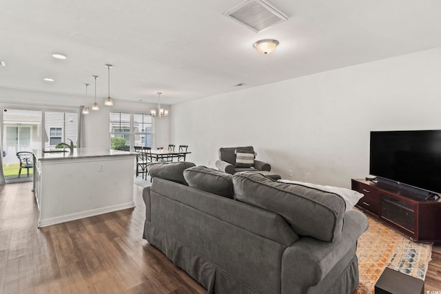1117 Fairway Ln Unit 1117, Conway, SC 29526 - living room with dark wood-type flooring and a chandelier