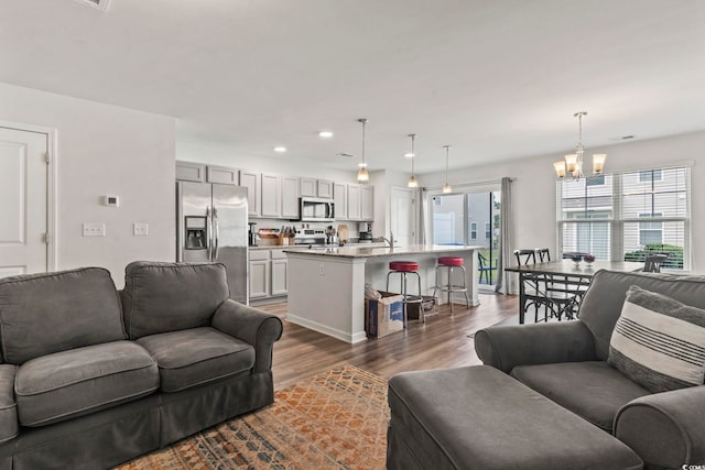 1117 Fairway Ln Unit 1117, Conway, SC 29526 - living area featuring a chandelier, dark wood-style floors, and recessed lighting