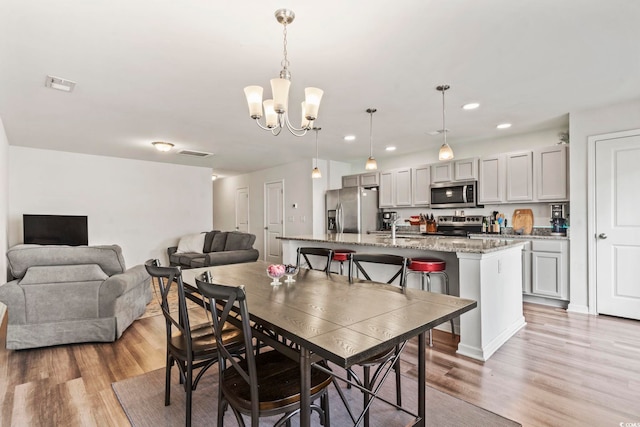 1117 Fairway Ln Unit 1117, Conway, SC 29526 - dining space featuring a chandelier, light wood finished floors, and recessed lighting