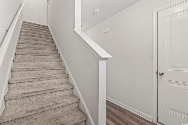 1117 Fairway Ln Unit 1117, Conway, SC 29526 - stairs featuring wood finished floors and baseboards