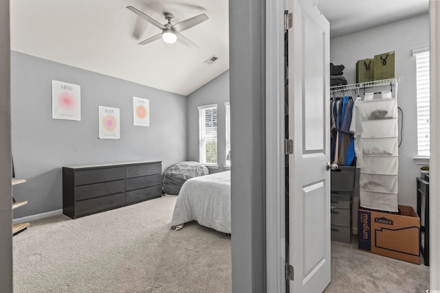 1117 Fairway Ln Unit 1117, Conway, SC 29526 - carpeted bedroom with a spacious closet, vaulted ceiling, and ceiling fan