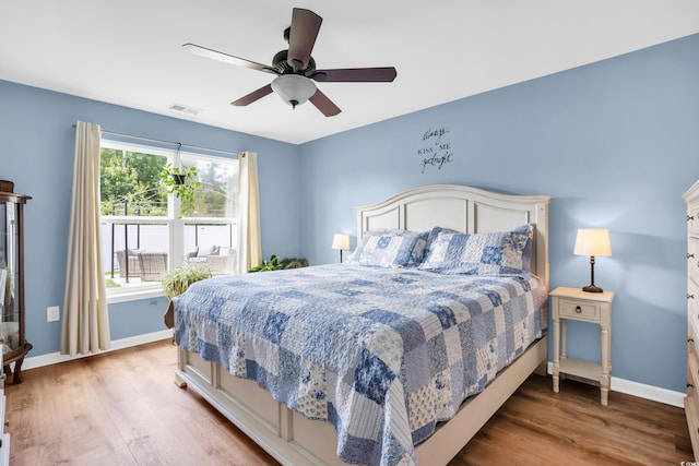 1201 Midtown Village Dr, Conway, SC 29526 - bedroom featuring wood finished floors and a ceiling fan