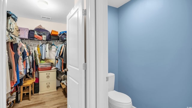 1201 Midtown Village Dr, Conway, SC 29526 - walk in closet featuring wood finished floors