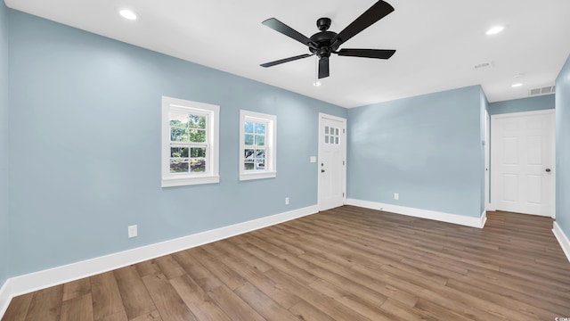 1553 Watson Ave, Little River, SC 29566 - spare room with wood finished floors, a ceiling fan, and recessed lighting