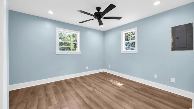 1553 Watson Ave, Little River, SC 29566 - empty room featuring electric panel, wood finished floors, recessed lighting, and ceiling fan