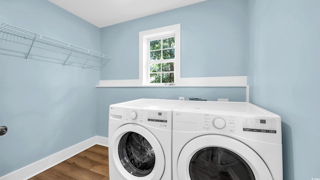 1553 Watson Ave, Little River, SC 29566 - laundry area featuring washing machine and clothes dryer and dark wood-type flooring