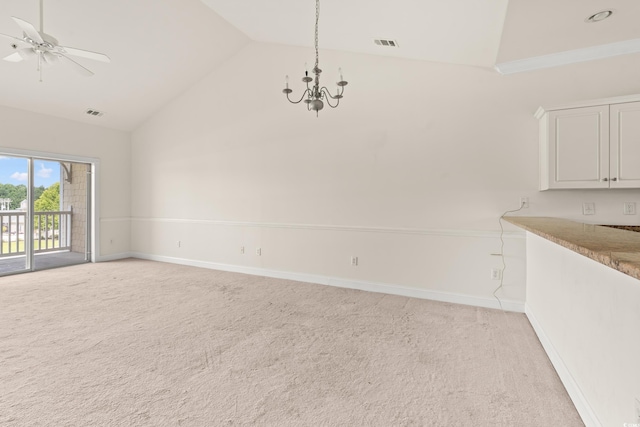 110 S Shore Blvd Unit 303, Longs, SC 29568 - unfurnished dining area featuring a chandelier, light carpet, high vaulted ceiling, and a ceiling fan