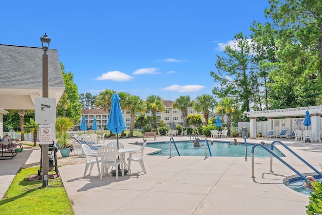 110 S Shore Blvd Unit 303, Longs, SC 29568 - community pool featuring a patio area