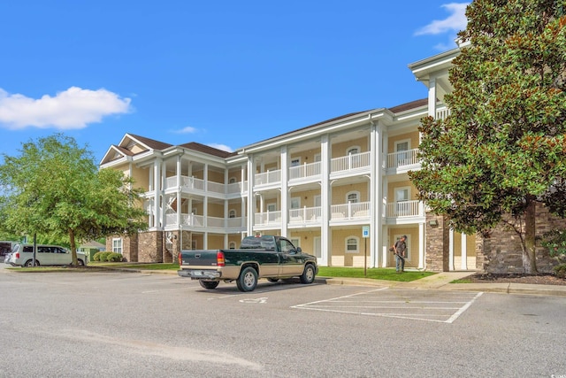 110 S Shore Blvd Unit 303, Longs, SC 29568 - view of apartment building / complex featuring uncovered parking