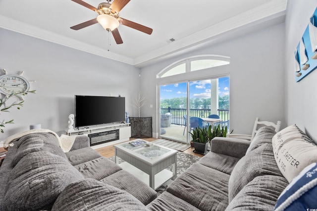 265 Venice Way Unit 1-404, Myrtle Beach, SC 29577 - living area featuring wood finished floors, ceiling fan, and ornamental molding