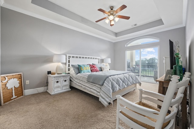 265 Venice Way Unit 1-404, Myrtle Beach, SC 29577 - bedroom with a tray ceiling, access to exterior, light colored carpet, and a ceiling fan