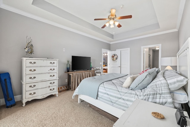 265 Venice Way Unit 1-404, Myrtle Beach, SC 29577 - bedroom featuring a raised ceiling, light colored carpet, crown molding, a closet, and ensuite bathroom