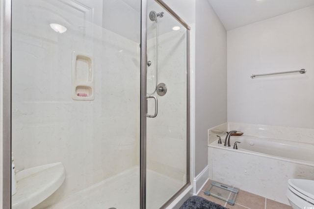 265 Venice Way Unit 1-404, Myrtle Beach, SC 29577 - bathroom with a stall shower, a bath, and tile patterned flooring