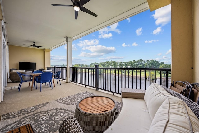 265 Venice Way Unit 1-404, Myrtle Beach, SC 29577 - balcony featuring a ceiling fan and outdoor dining space