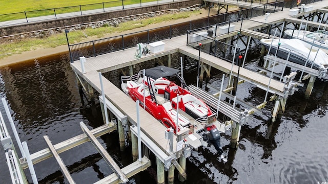 265 Venice Way Unit 1-404, Myrtle Beach, SC 29577 - dock featuring boat lift and a water view