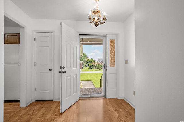 1415 Fox Hollow Way N, Myrtle Beach, SC 29582 - foyer featuring light wood-style flooring and a chandelier