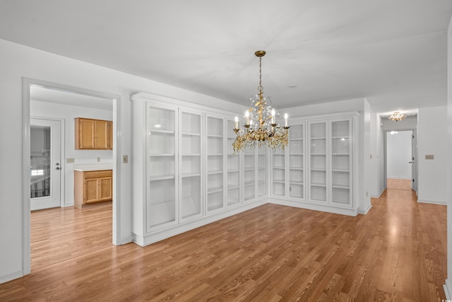1415 Fox Hollow Way N, Myrtle Beach, SC 29582 - unfurnished dining area featuring a chandelier and light wood-type flooring