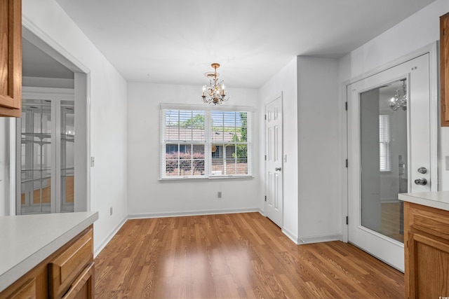 1415 Fox Hollow Way N, Myrtle Beach, SC 29582 - unfurnished dining area featuring a chandelier and light wood finished floors