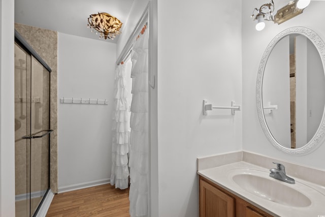1415 Fox Hollow Way N, Myrtle Beach, SC 29582 - bathroom featuring vanity, wood finished floors, and a shower stall