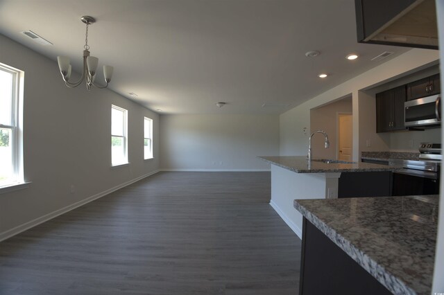 205 Kc Ln, Aynor, SC 29511 - kitchen featuring appliances with stainless steel finishes, a chandelier, open floor plan, dark wood-style floors, and recessed lighting